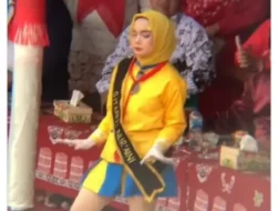 Viral! Mayoret Berhijab Kuning Pakai Rok Mini Asyik Joget Pimpin Iringan Drum Band