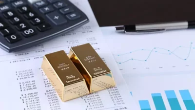 Ingin Investasi Logam Mulia? Kamu Wajib Tahu Aturan Pajak Emas Terbaru Ini!